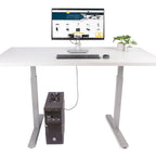 White desk with computer setup on a white background