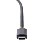 StarTech Accessory USB‑C HDMI VGA DVI adapter displayed in side view