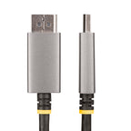 StarTech 133DISPLAYPORTHDMI21 2m DisplayPort to HDMI 2.1 Cable, cable coiled on surface