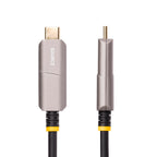 StarTech 146B-USBC-HDMI4K-AOC 50ft USB-C to HDMI 4K 60Hz Active Optical Cable black cable coiled on a surface