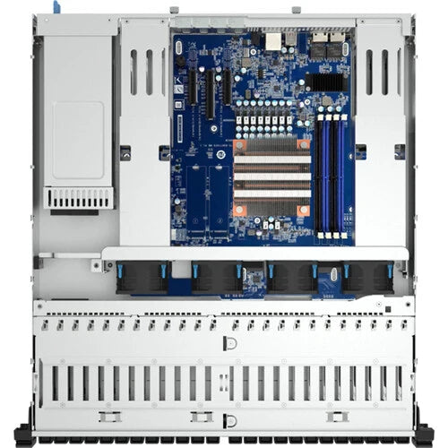 Computer motherboard inside an open computer case on a white background