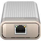 A silver and beige rectangular electronic device with a ribbed top surface and a front RJ45 Ethernet port, shown on a plain white background.