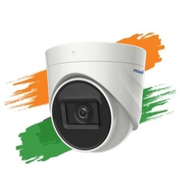 A white dome security camera with a black lens surround, shown against a white background with orange and green paint strokes resembling the Indian flag. The brand name 'PRAMIAR' is visible on the side of the camera.