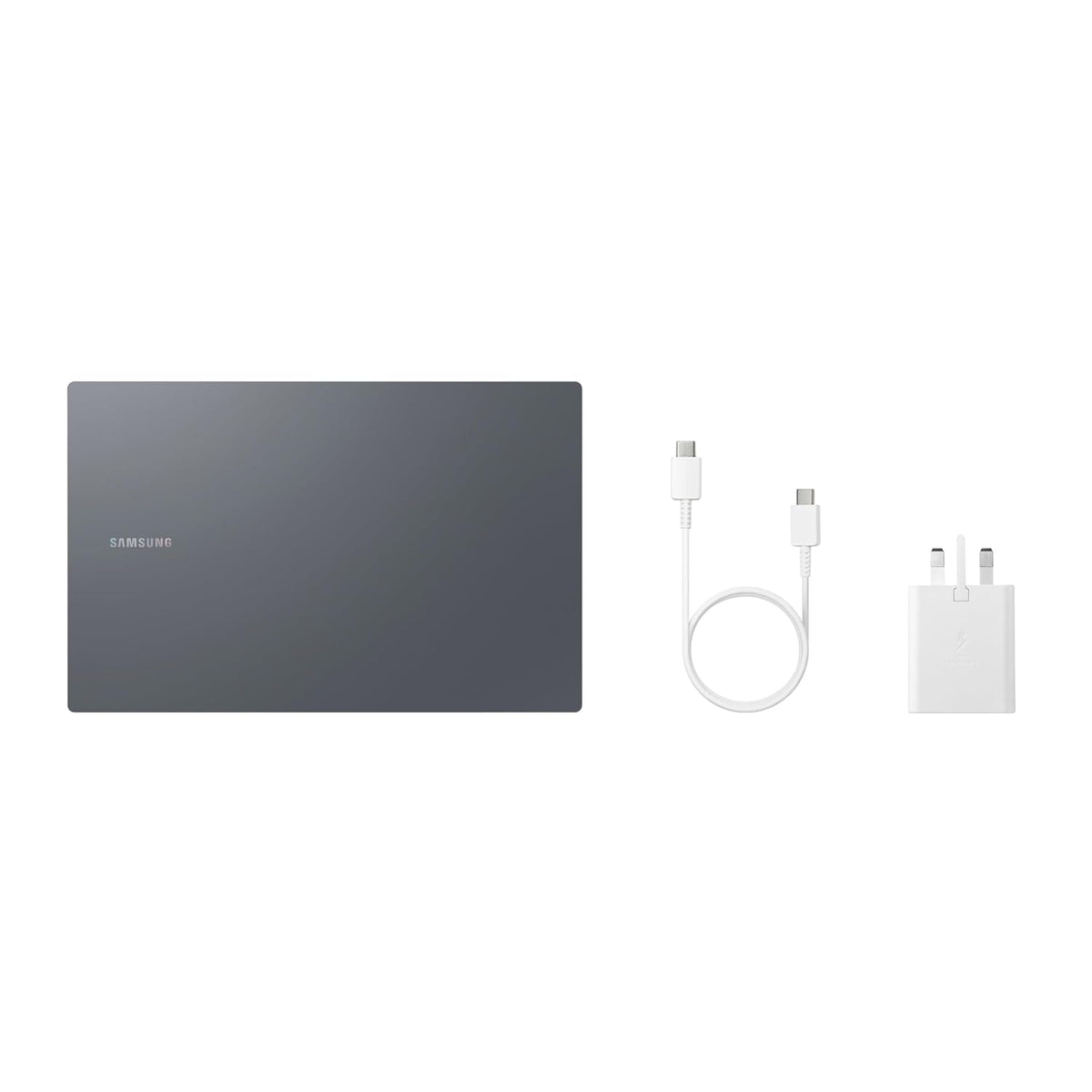 Samsung laptop with charger and cable on a white background