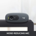 Logitech webcam with noise-reducing mic on a white background