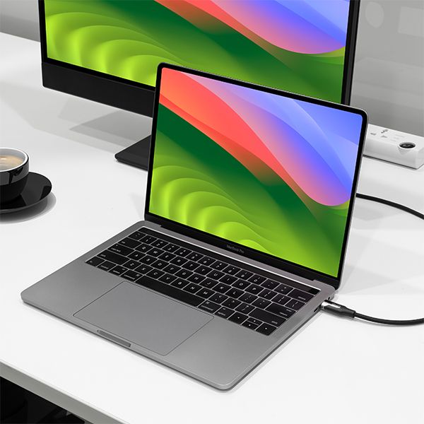 USB-C 3.1 sync and charge cable plugging into a laptop’s USB-C port.