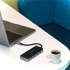 Side view of Cadyce CA-CC4H10G USB‑C hub revealing its slim profile