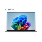 A silver laptop shown open on a white background, with a colorful abstract wallpaper on the screen and the text 'Copilot+PC' in the upper left.