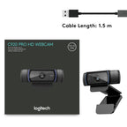 Logitech C920 Pro HD webcam with packaging and USB cable on a white background