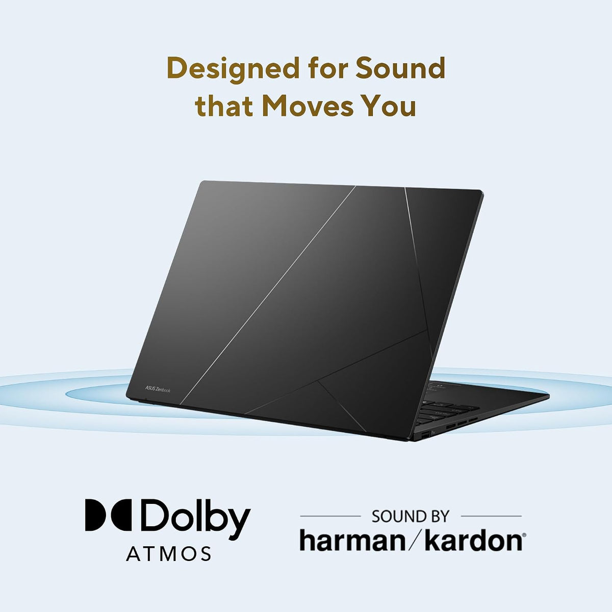 A black laptop shown open at an angle on a light blue background, with the text 'Designed for Sound that Moves You' above it and Dolby Atmos and harman/kardon branding below.