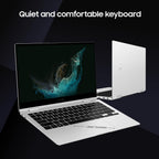 Laptop with open lid showing screen and keyboard, closed lid on side, on dark background.
