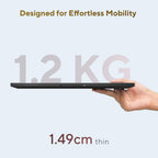 A hand holding a slim black laptop edge against a light blue background, with text reading 'Designed for Effortless Mobility', '1.2 KG', and '1.