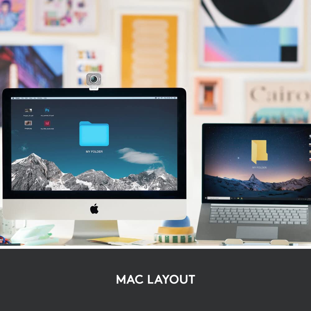 Two computer monitors on a desk with a Mac layout theme.
