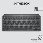 Logitech keyboard with USB cable on a light gray background