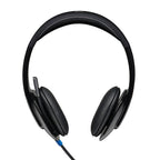 Black headphones with a visible brand logo on a white background
