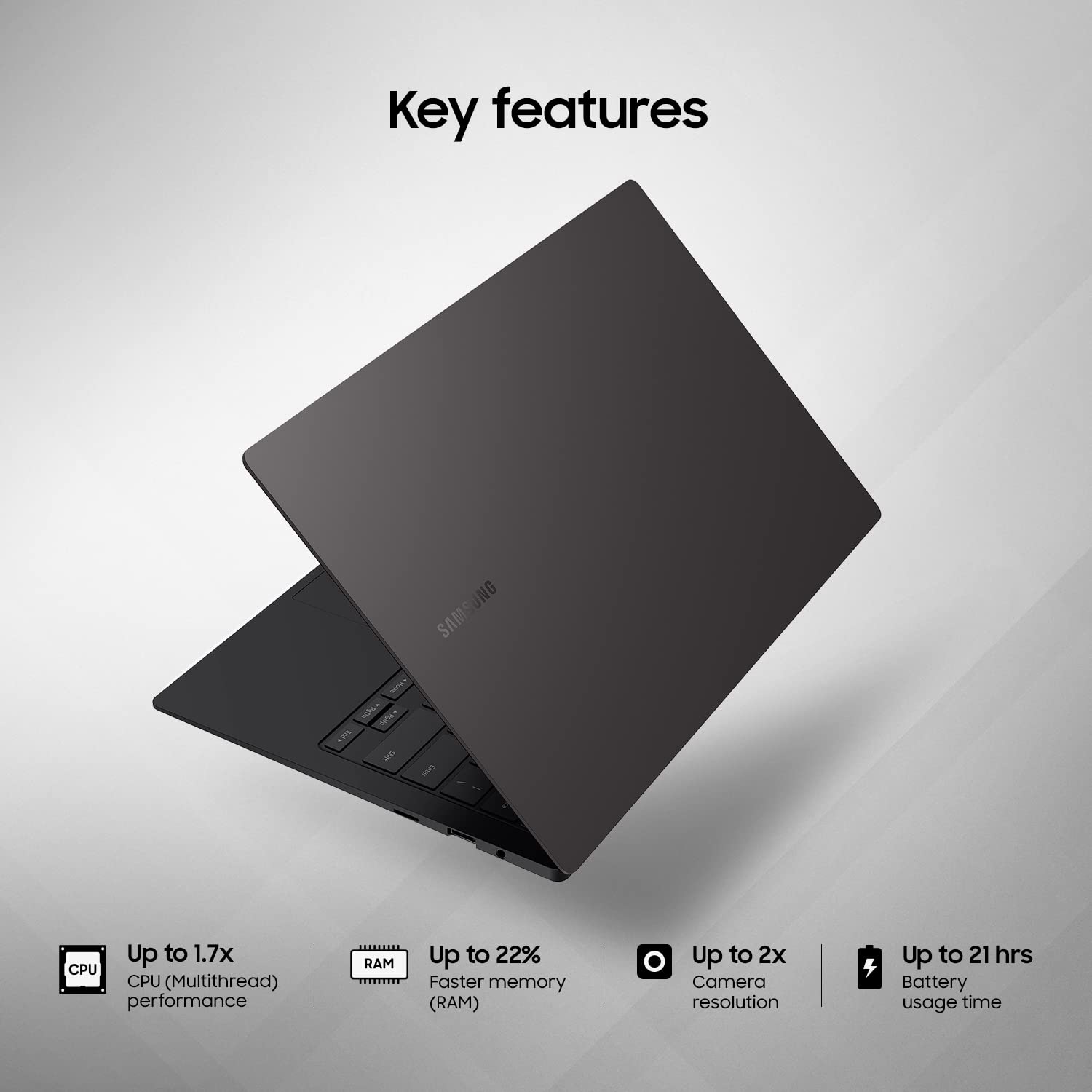 A dark gray Samsung laptop shown open at an angle on a light gray background, with the text 'Key features' above it and feature callouts along the bottom.