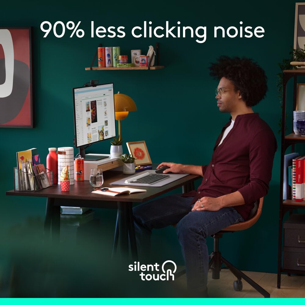 Person sitting at a desk with computer equipment, featuring 'silent touch' branding.