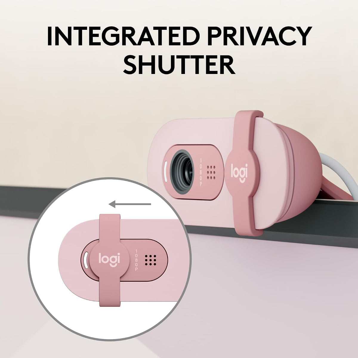 Pink webcam with integrated privacy shutter on a light background