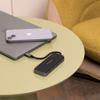 Cadyce CA-CC4H10G hub connected to a laptop, demonstrating plug‑and‑play