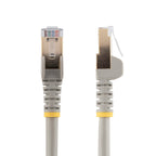 StarTech C6ASPAT10GR 10ft Cat6a Shielded Ethernet Cable – Grey cable coiled on a surface