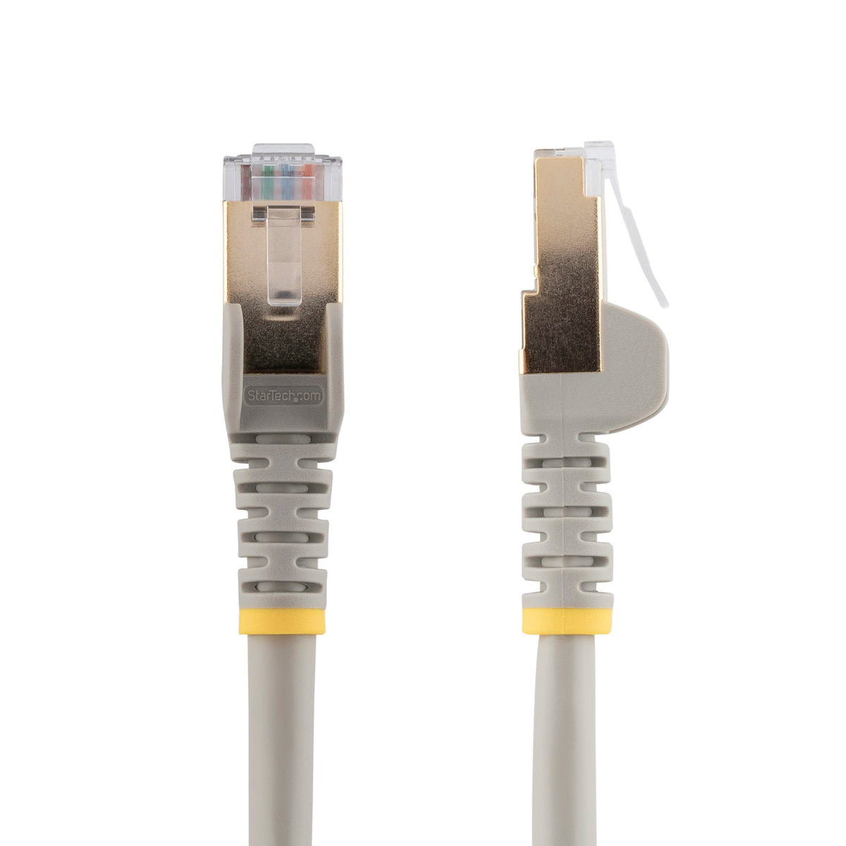 StarTech C6ASPAT10GR 10ft Cat6a Shielded Ethernet Cable – Grey cable coiled on a surface