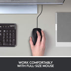 Hand using a Logitech mouse on a desk with keyboard and monitor, text 'Work Comfortably with Full-Size Mouse'.