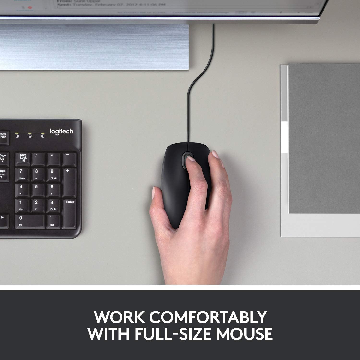 Hand using a Logitech mouse on a desk with keyboard and monitor, text 'Work Comfortably with Full-Size Mouse'.