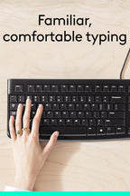 Person typing on a black keyboard with text 'Familiar, comfortable typing' above.
