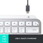 Keyboard with USB-C charging cable on a white background