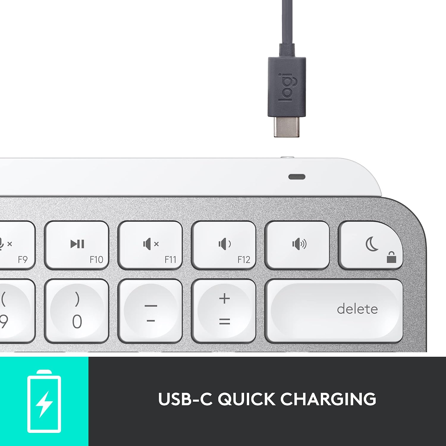 Keyboard with USB-C charging cable on a white background