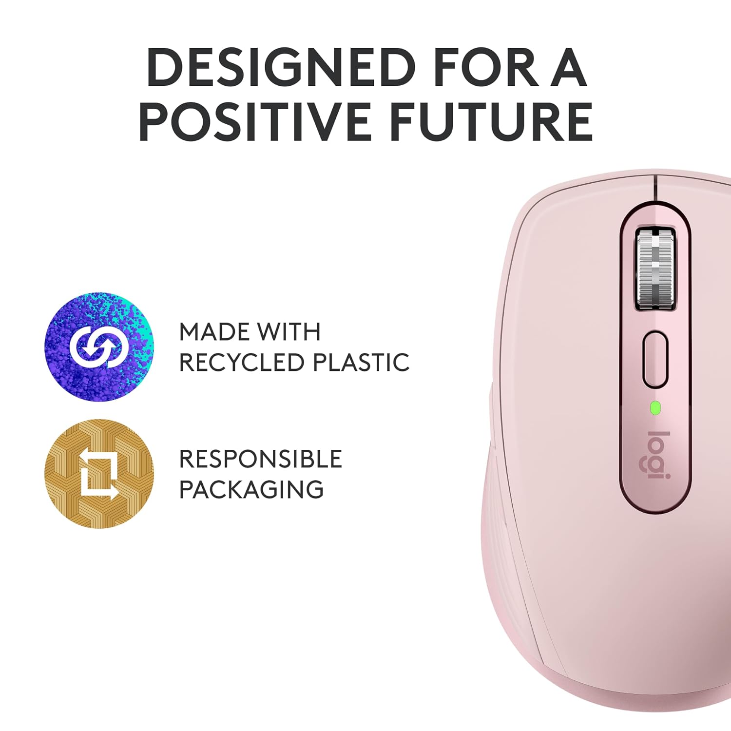 Pink computer mouse with eco-friendly design features on a white background