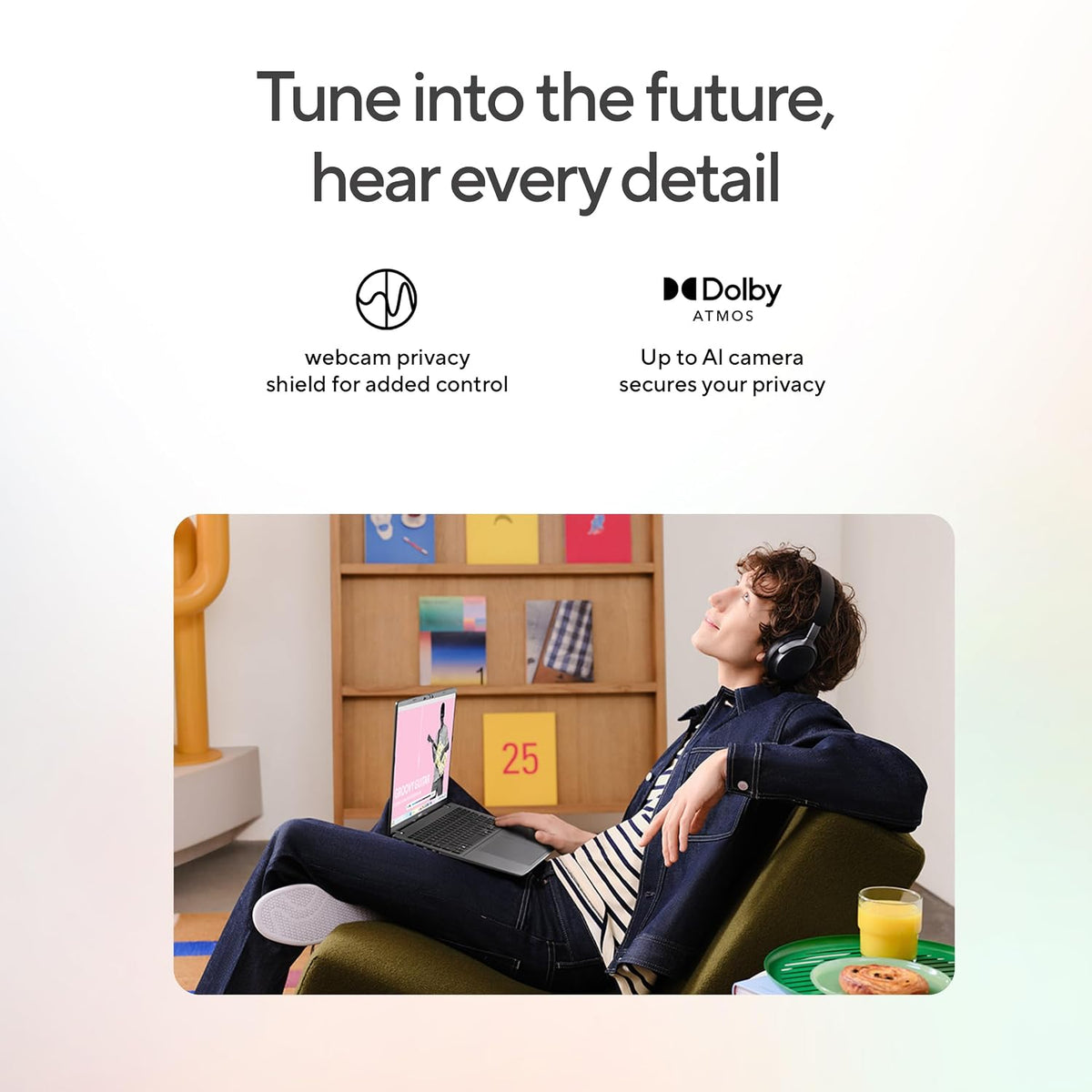 Promotional graphic with the headline 'Tune into the future, hear every detail' and feature icons for webcam privacy and Dolby Atmos. Below, a person wearing over-ear headphones relaxes in a chair using a laptop in a modern room.