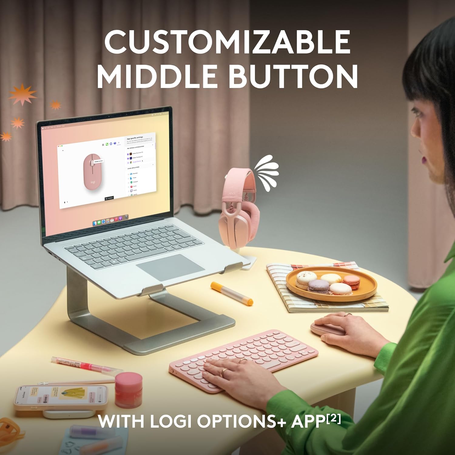Person using a laptop with a customizable middle button feature, shown on screen.