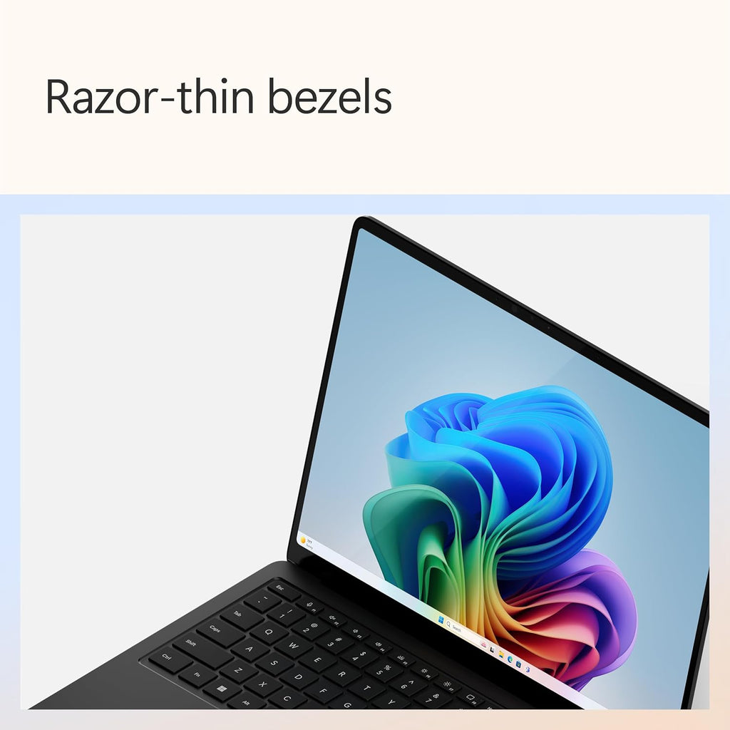 Laptop with razor-thin bezels and colorful display on a light background