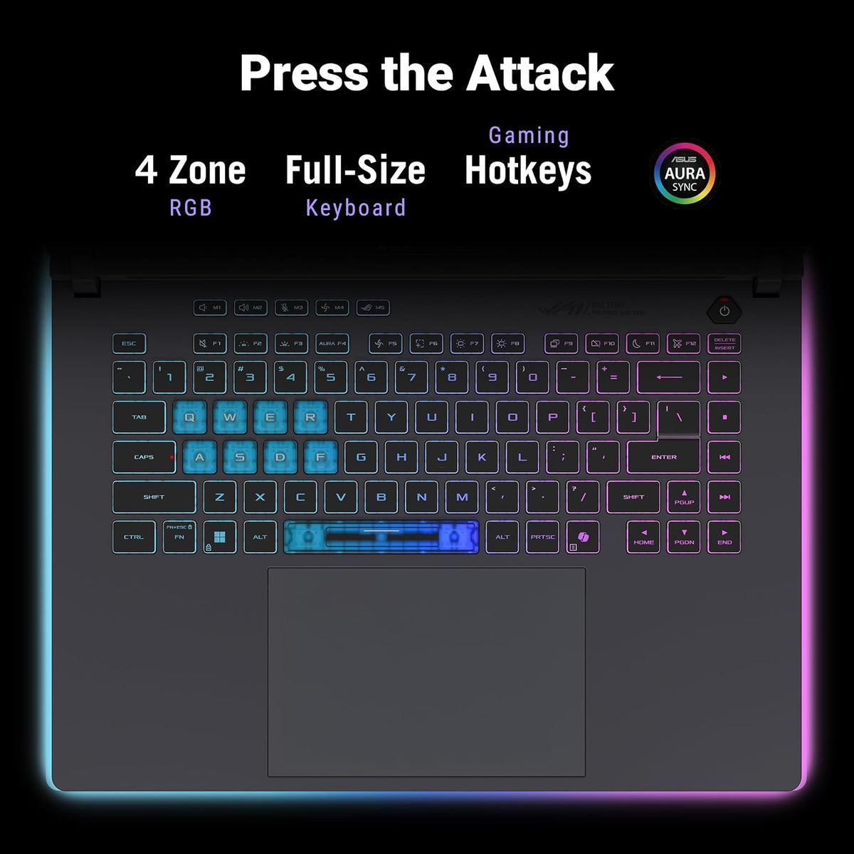 A dark gaming laptop keyboard with RGB backlighting, shown on a black background with promotional text reading 'Press the Attack' and '4 Zone RGB Full-Size Hotkeys.' The keyboard has blue and cyan lighting accents, and the image includes a small circular 'Works with AURA 3000' badge.