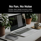 Laptop on a desk with a small device labeled 'No Fan, No Noise' and text about fanless design.