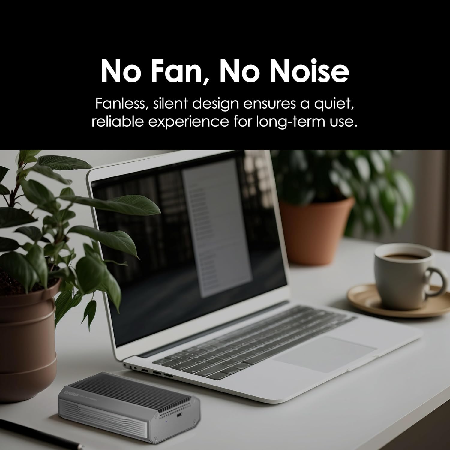 Laptop on a desk with a small device labeled 'No Fan, No Noise' and text about fanless design.