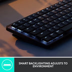 Black keyboard with smart backlighting feature on a dark surface