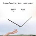 A thin black laptop floating above an outstretched hand against a soft sky background, with marketing text reading 'More freedom, less boundaries' and 'Starting at 1.59 cm Thin' and '1.