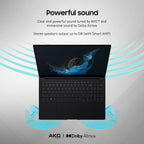 A black convertible laptop shown open on a light gray background with promotional text about powerful sound, AKG tuning, and Dolby Atmos, plus blue wave graphics and AKG | Dolby Atmos branding.