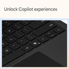 Black keyboard with text 'Unlock Copilot experiences' on a light blue background