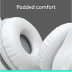 Close-up of a white pillow with 'Padded comfort' text on a gray background