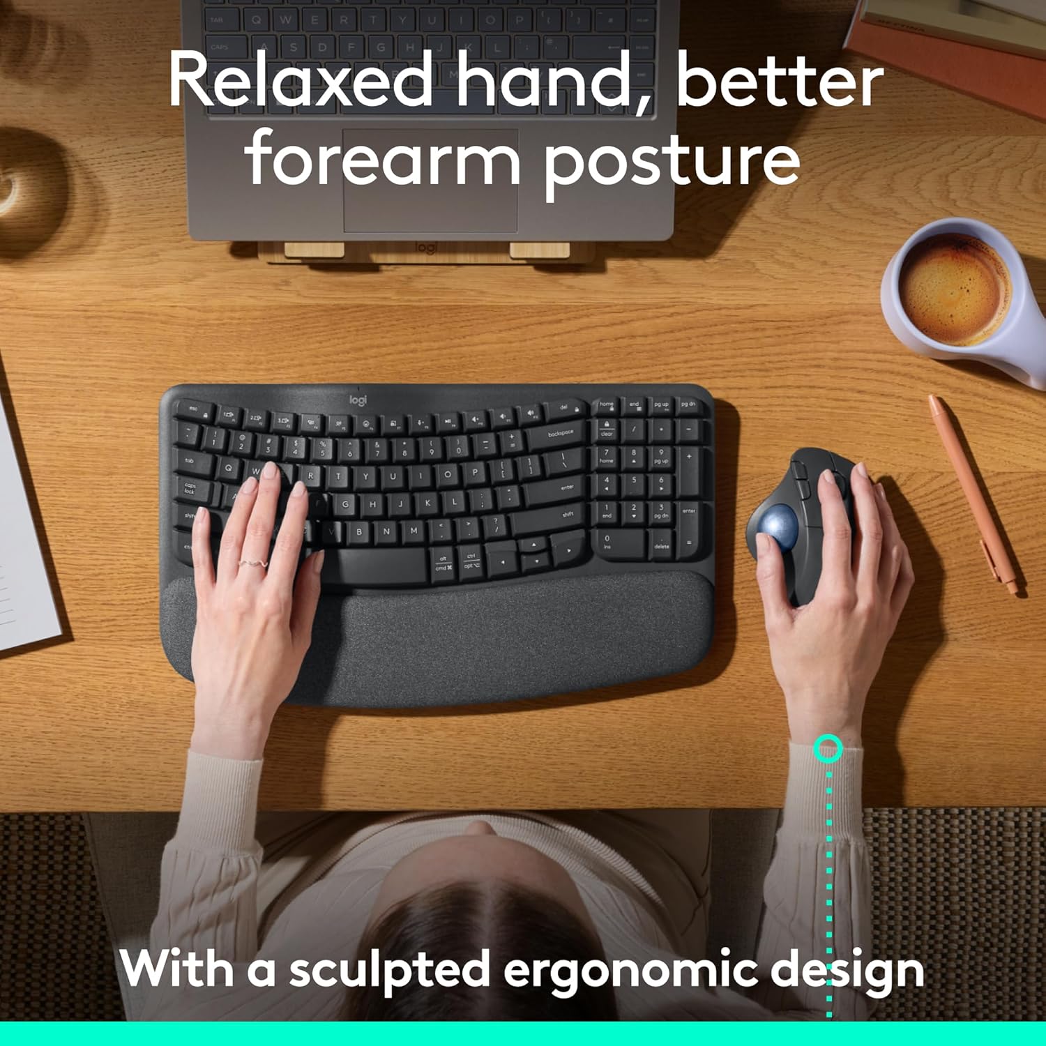 Person using an ergonomic keyboard and mouse setup on a desk with text highlighting better forearm posture.
