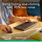 Person using a keyboard and mouse with text about silent typing and clicking, on a desk with a cup of tea.