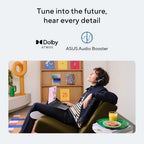 Person sitting on a couch with a laptop, surrounded by ASUS Audio Booster and Dolby Atmos branding.