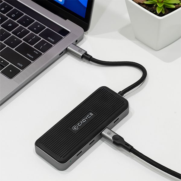 Cadyce CA-CC4H10G hub with cable attached, emphasizing 10Gbps capability
