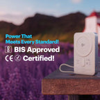 Power bank on a wooden surface with lavender and mountains in the background, featuring certification text.