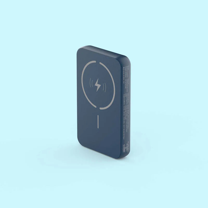 Wireless charging pad on a light blue background