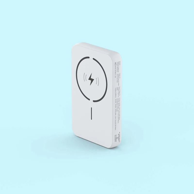 A white rectangular portable power bank with rounded corners, featuring a black wireless charging symbol on the front, set against a solid light blue background.