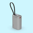 Silver power bank with a black strap on a light blue background